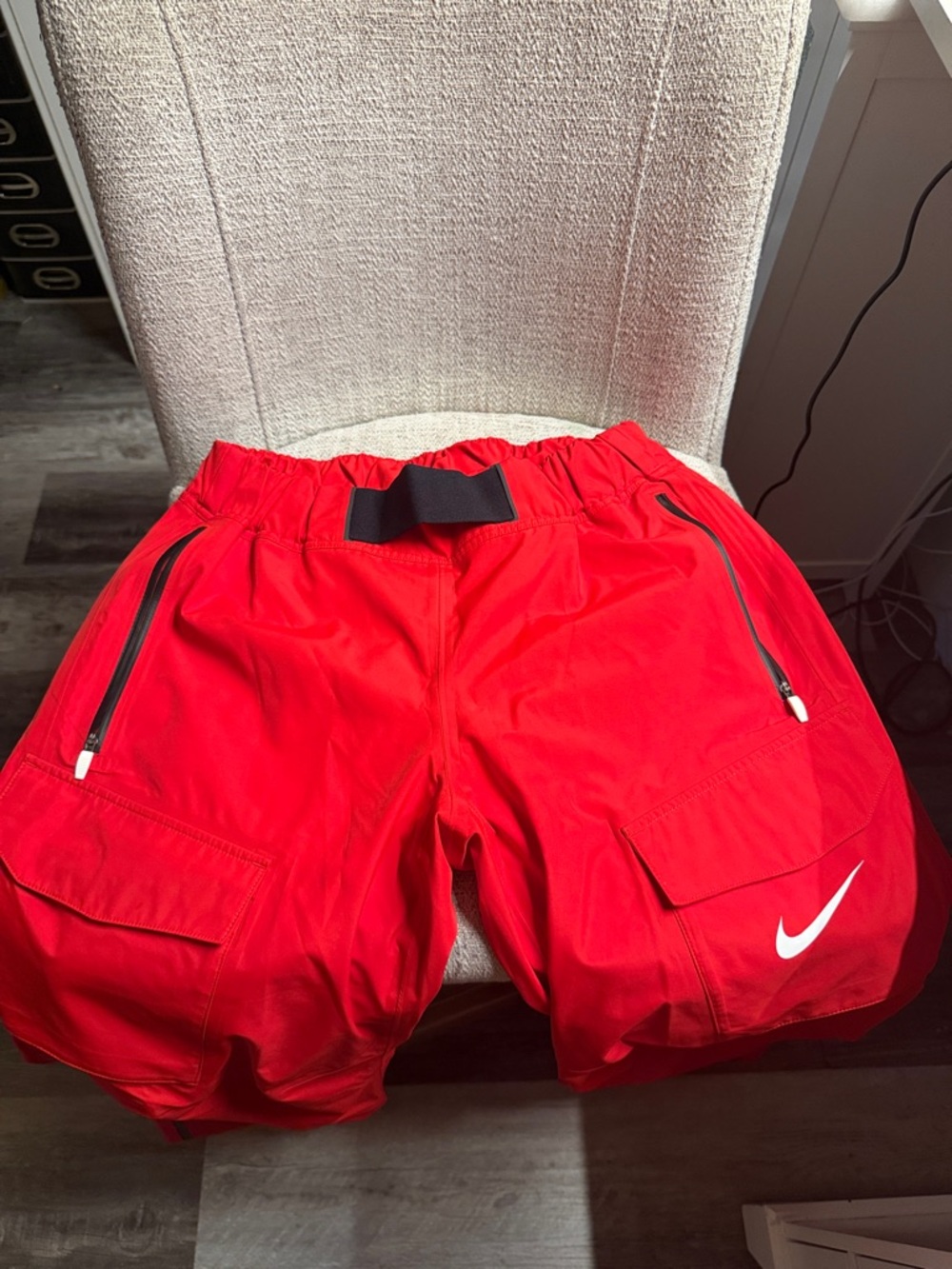 Nike Bright Red Cargo Track Pants with White Swoosh